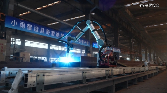 Xiaoyubot welding cobot arm striking a bright arc on a factory production line