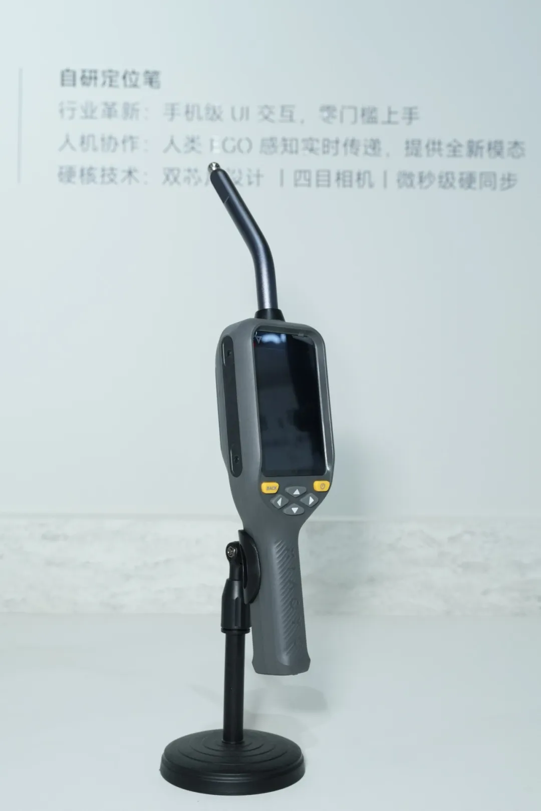 Close-up of Xiaoyubot self-developed handheld positioning pen with screen and welding-torch tip